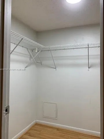 a view of a room with racks on the wall