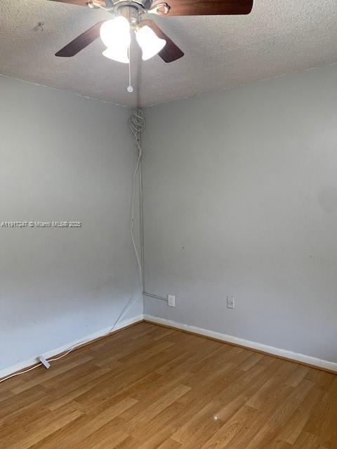 Delray Beach Delray Beach, FL 33445 - Photo 3 of 20 a view of an empty room with a chandelier fan