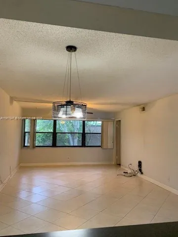 a view of an room with a ceiling fan