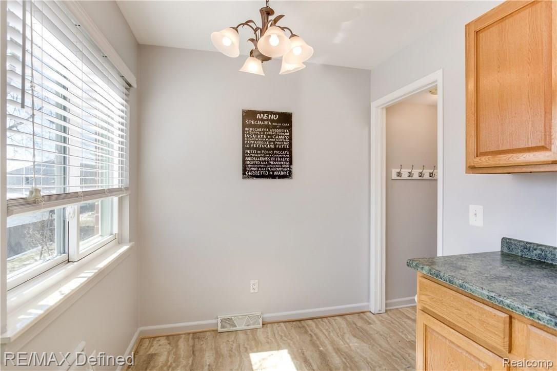 440 Miller Avenue, Unit 35 Rochester, MI 48307 - Photo 9 of 16 Neutral flooring and light wall color make this space inviting