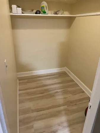 a view of a bathroom from the hallway
