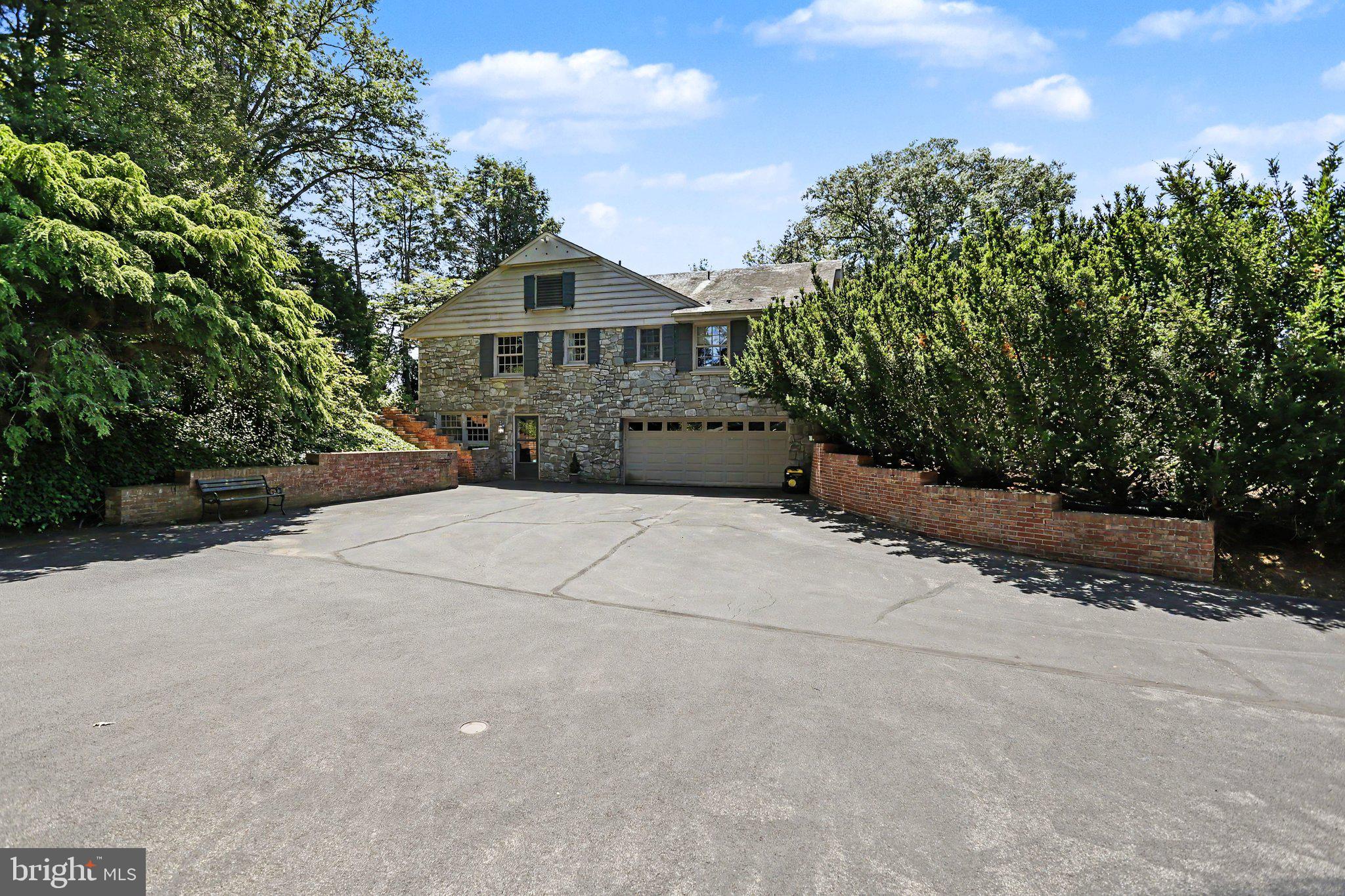 2210 Stratford Road Lancaster, PA 17603 - Photo 6 of 62 Side Load Garage with Brick Retaining Walls