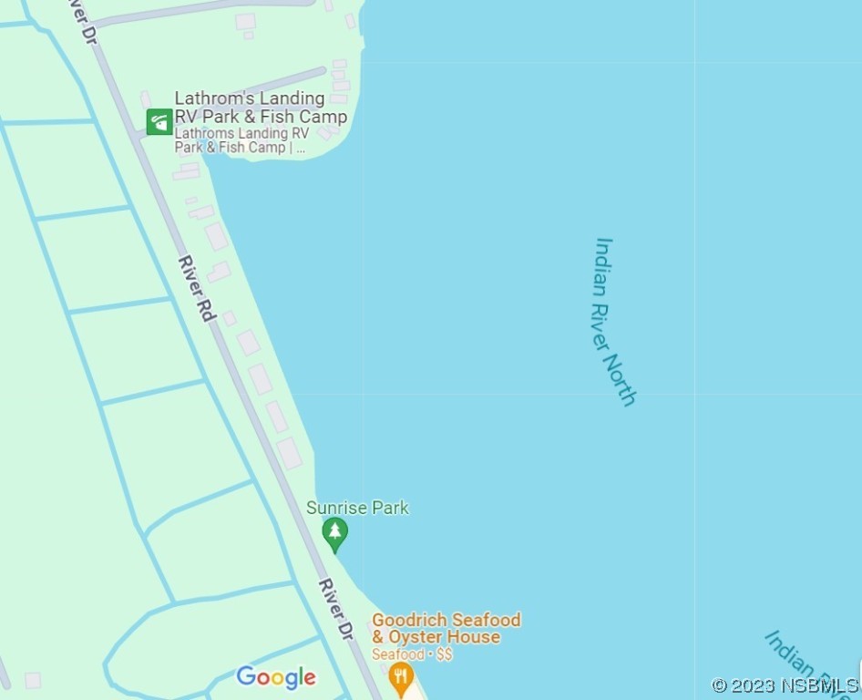 303 River Road Oak Hill, FL 32759 - Photo 3 of 5 a bathroom with a window