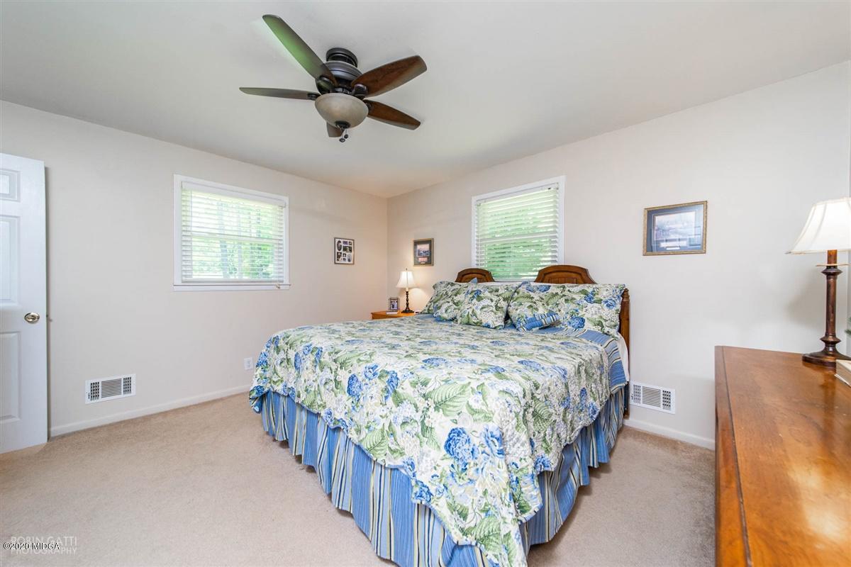 245 Plentitude Church Road Gray, GA 31032 - Photo 15 of 31 a bedroom with bed and window