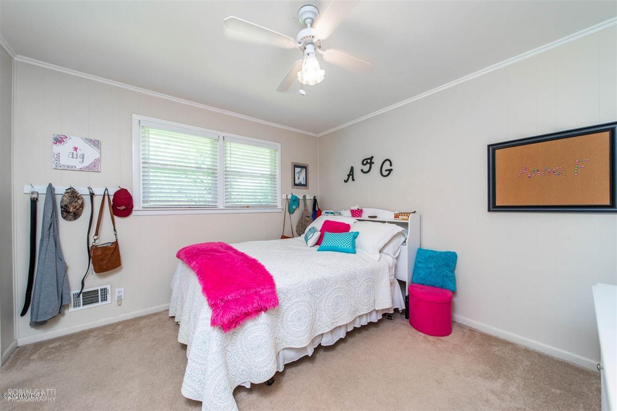 245 Plentitude Church Road Gray, GA 31032 - Photo 18 of 31 a bedroom with bed and a window