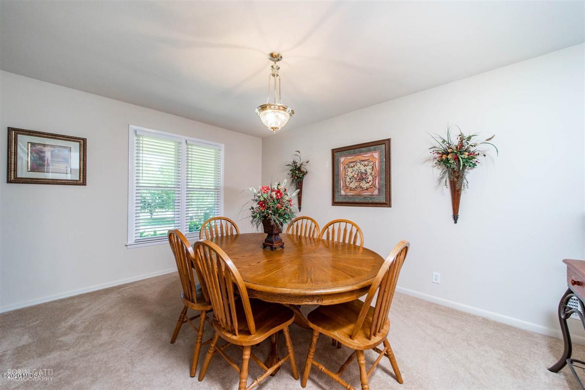 245 Plentitude Church Road Gray, GA 31032 - Photo 21 of 31 a dining room with furniture and window