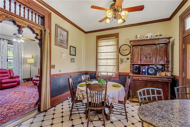 a view of living room kitchen and entryway
