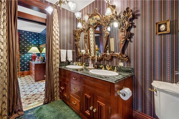 a bathroom with a tub and a sink