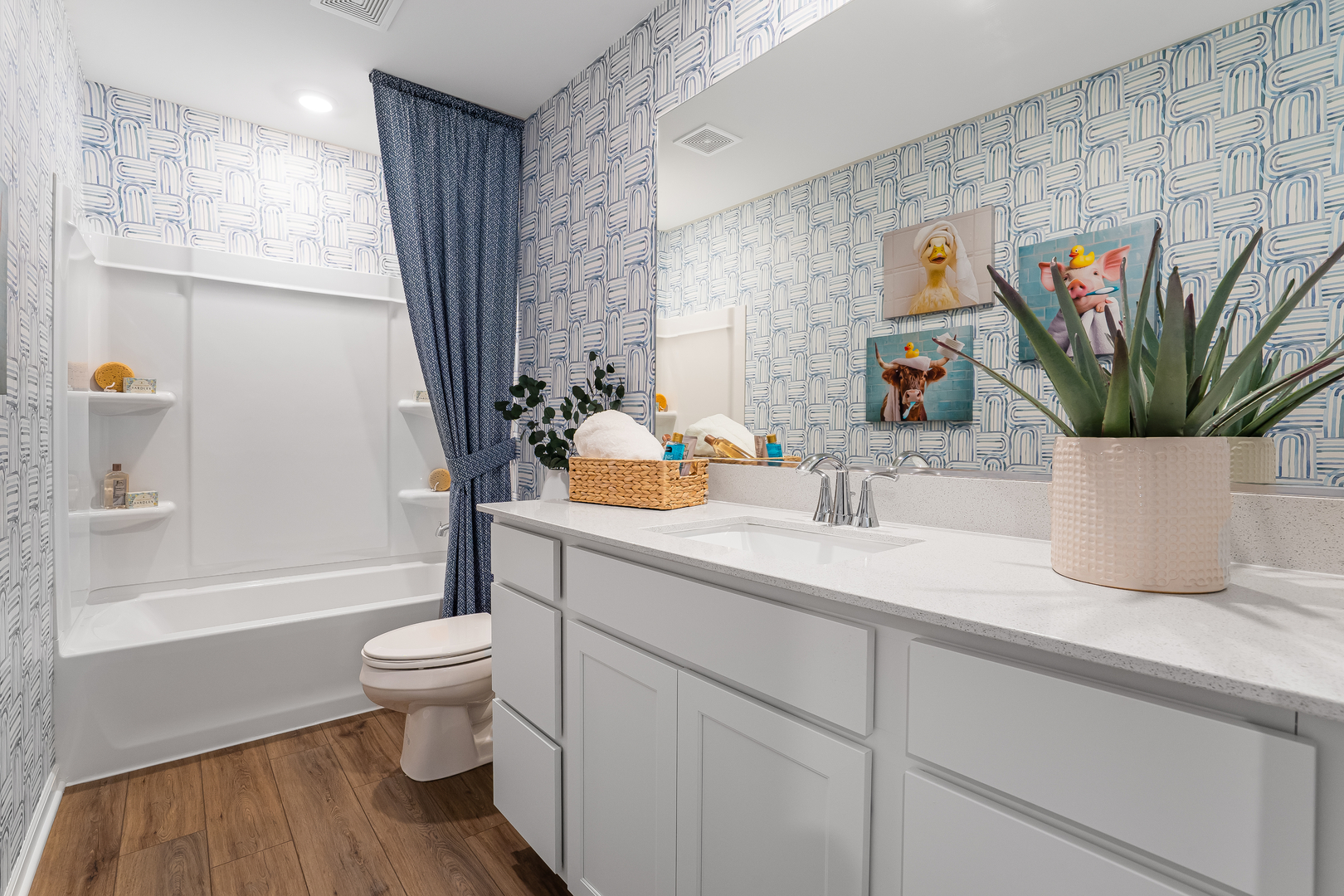 4044 Meadowridge Road Woodstock, IL 60098 - Photo 21 of 23 a bathroom with a toilet sink and mirror