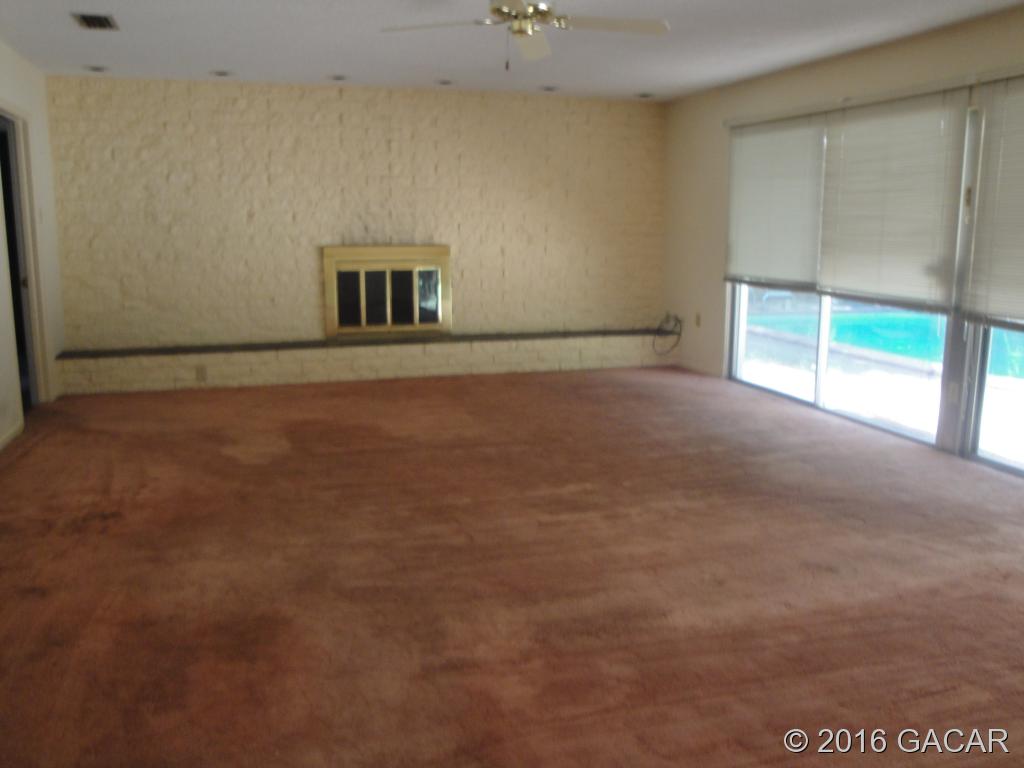 3951 Southwest 5th Place Gainesville, FL 32607 - Photo 9 of 19 Family Room with Fireplace