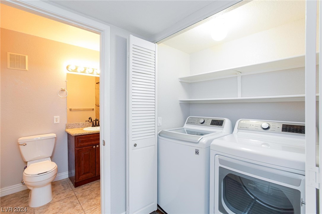 7950 West Flamingo Road, Unit 2072 Las Vegas, NV 89147 - Photo 27 of 36 washer and dryer closet with new washer and dryer