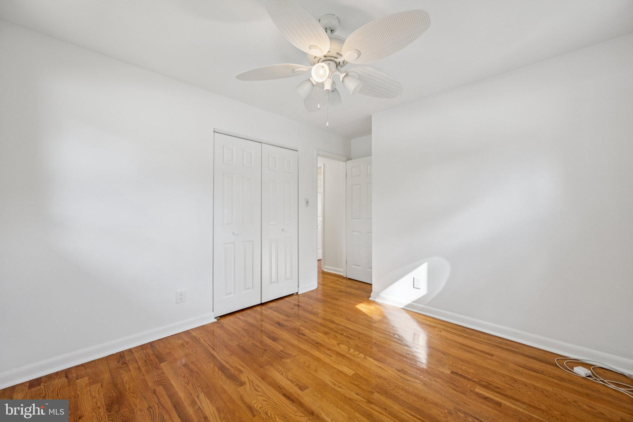 9801 Arbor Hill Drive Silver Spring, MD 20903 - Photo 13 of 28 Bright and airy room with hardwood floors.