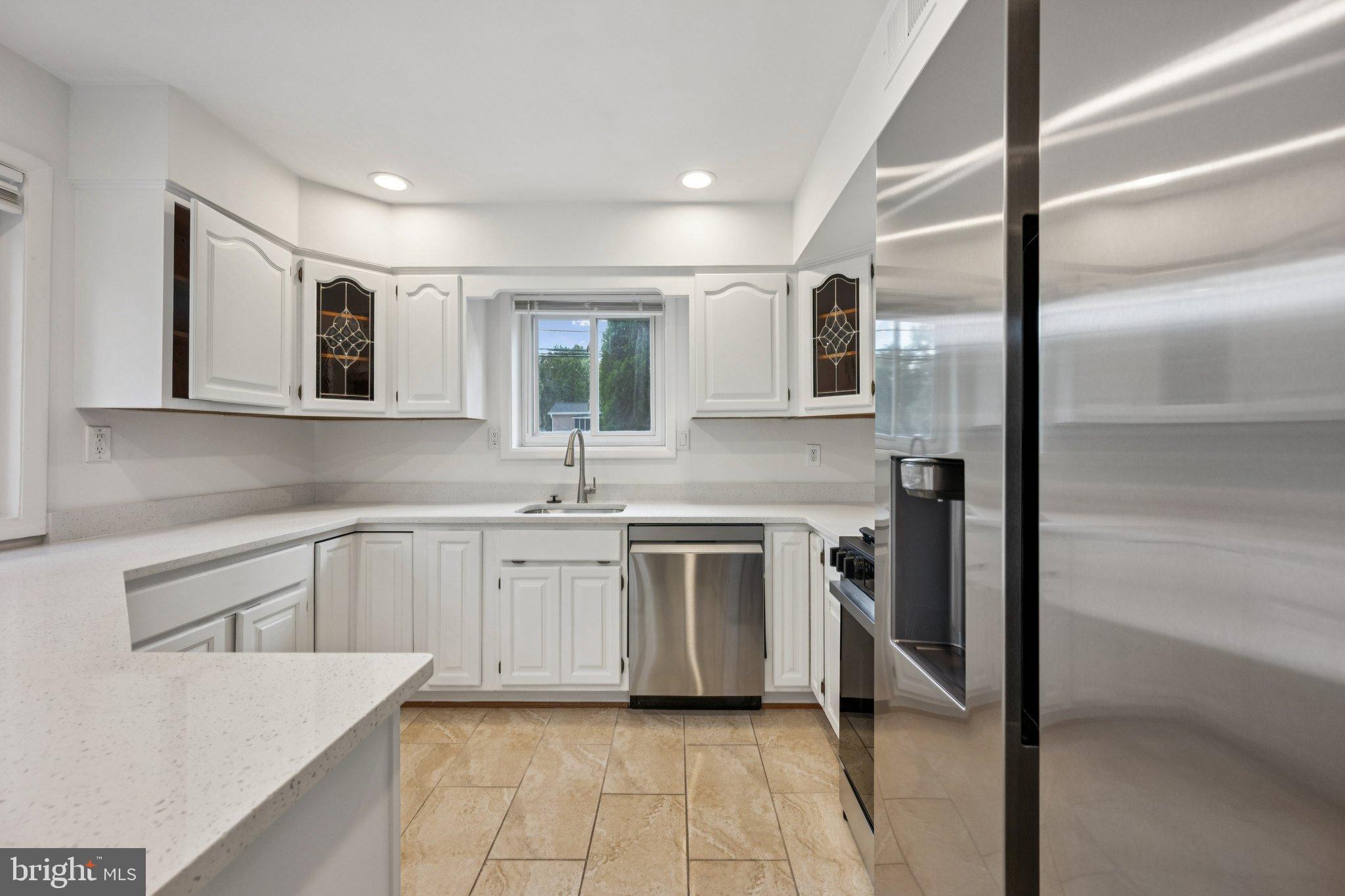 9801 Arbor Hill Drive Silver Spring, MD 20903 - Photo 8 of 28 Modern kitchen with sleek finishes.