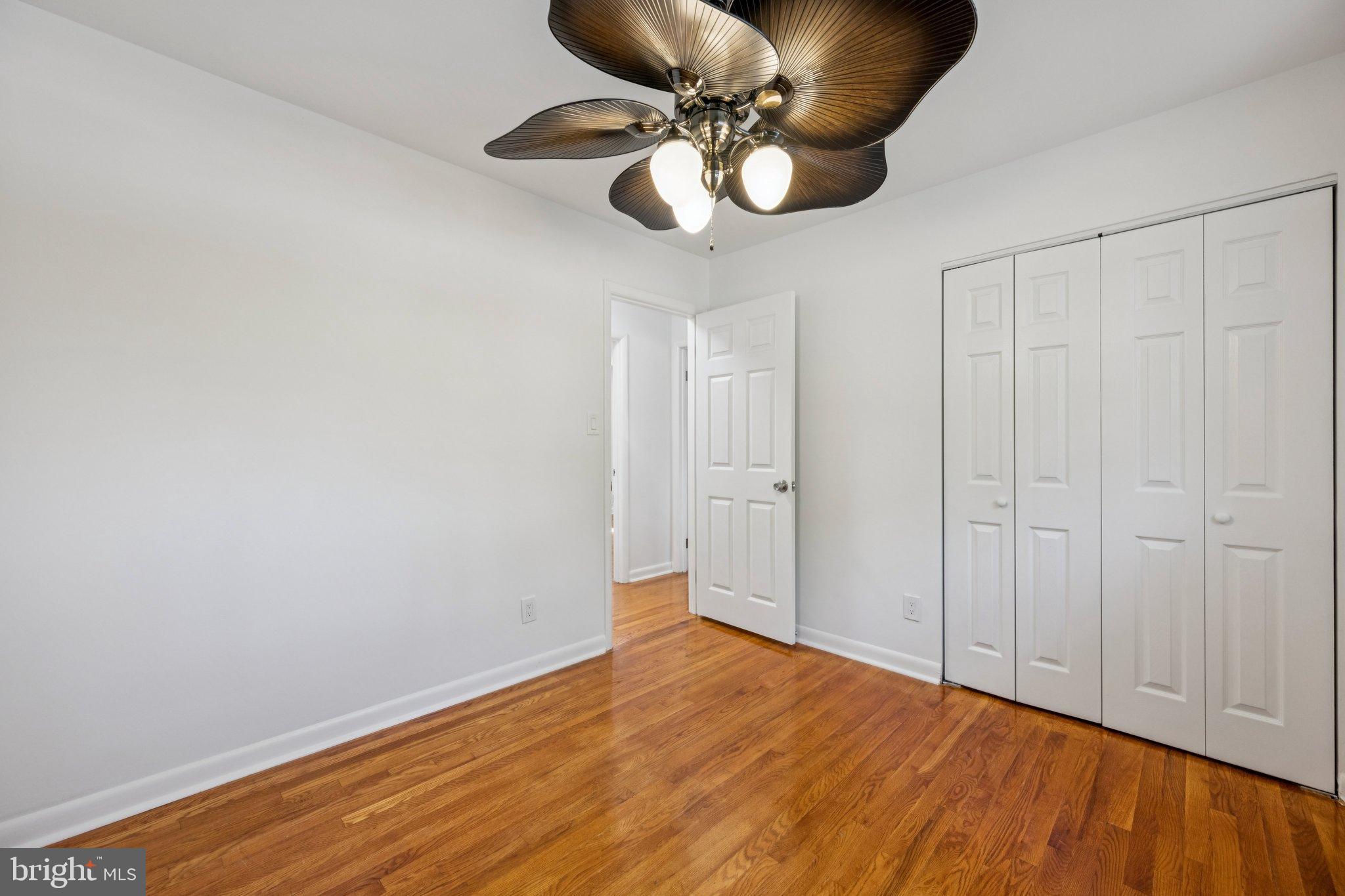 9801 Arbor Hill Drive Silver Spring, MD 20903 - Photo 10 of 28 Bright and airy bedroom with elegant ceiling fan.