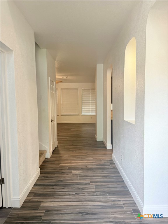 311 Crowfoot Drive Harker Heights, TX 76548 - Photo 3 of 21 a view of a room with wooden floor and staircase
