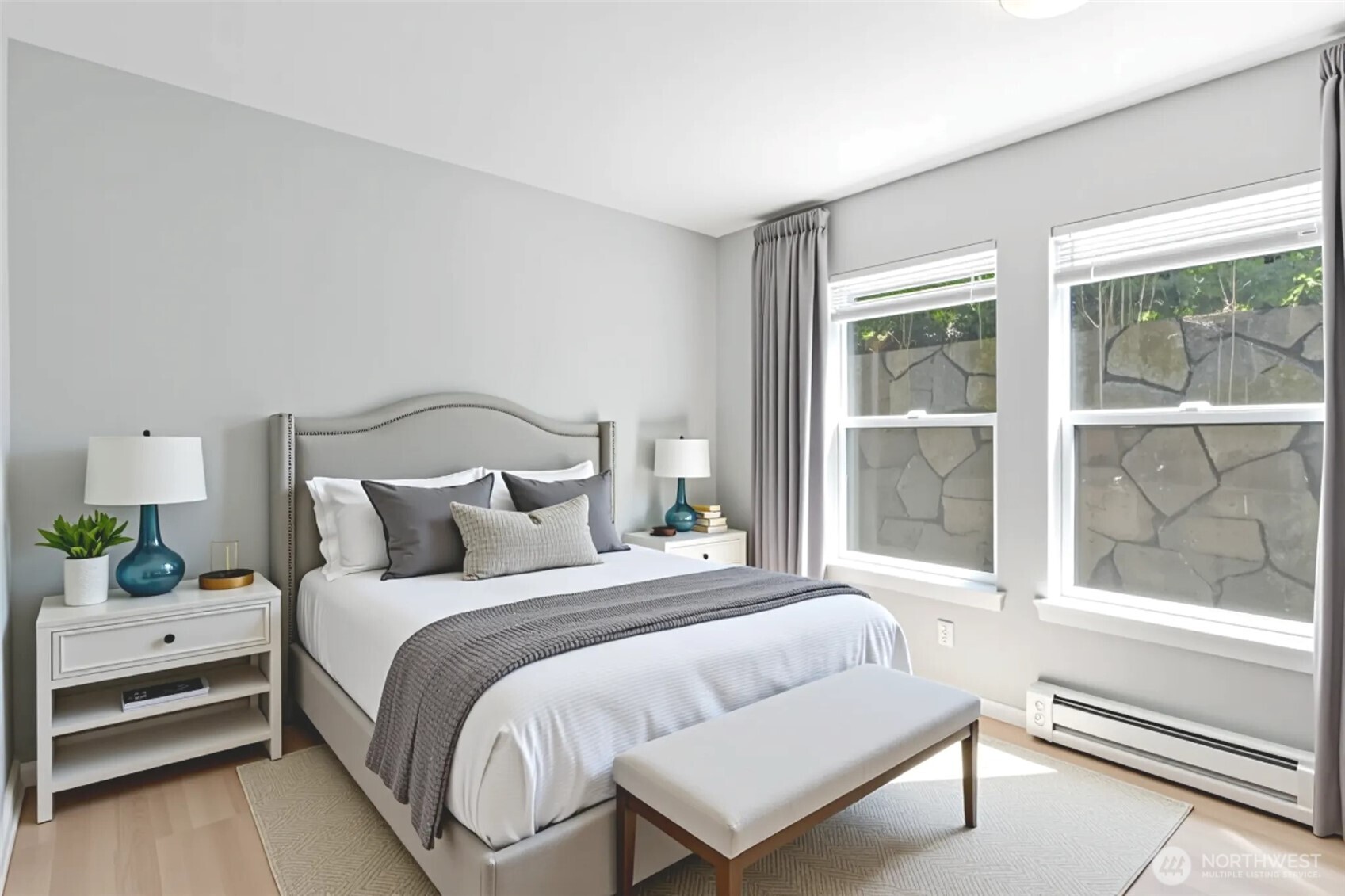 33020 10th Avenue Southwest, Unit Z203 Federal Way, WA 98023 - Photo 19 of 25 a bedroom with a bed and a large window