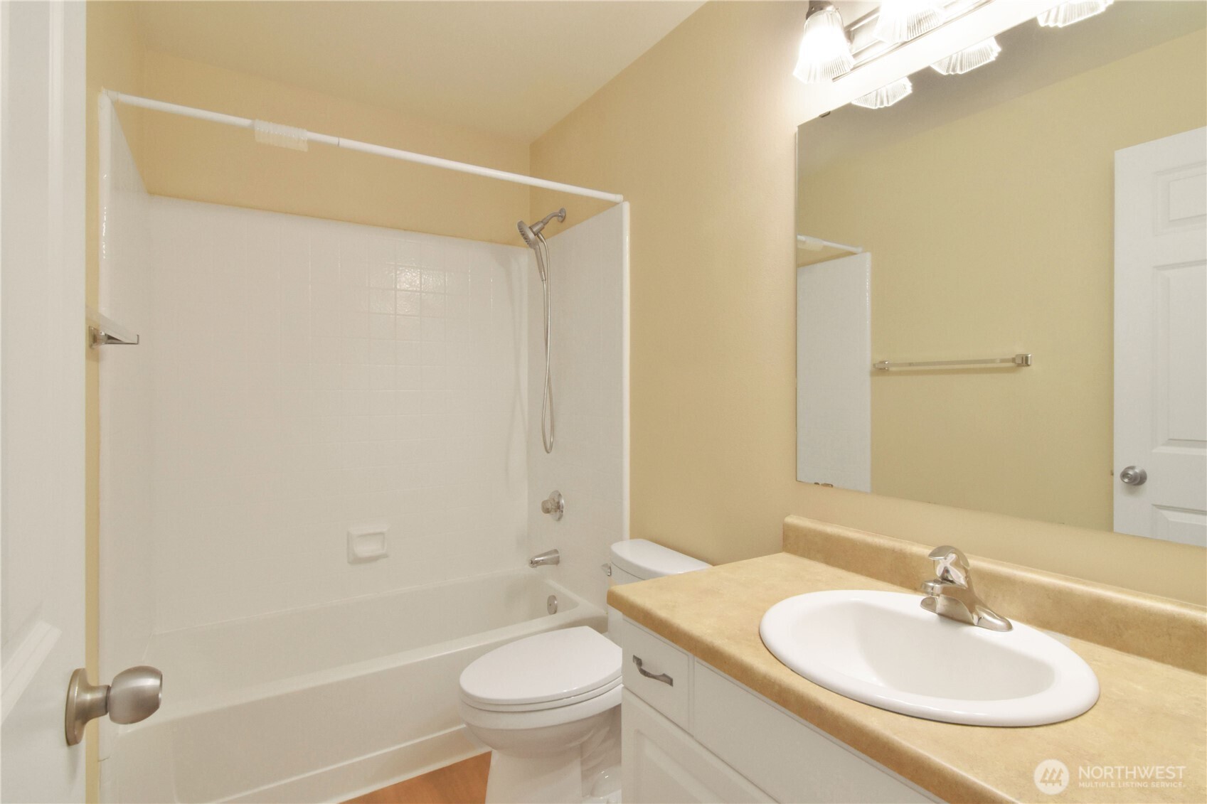 33020 10th Avenue Southwest, Unit Z203 Federal Way, WA 98023 - Photo 22 of 25 a bathroom with a sink and a mirror