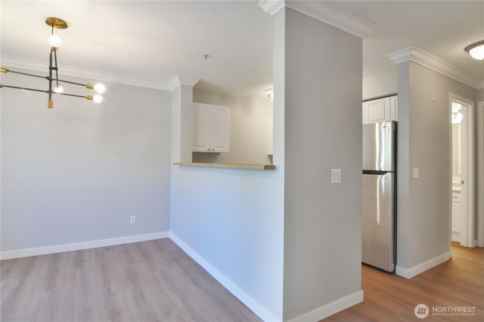 33020 10th Avenue Southwest, Unit Z203 Federal Way, WA 98023 - Photo 7 of 25 a view of empty room with wooden floor