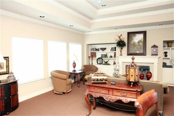 a room with furniture and a window