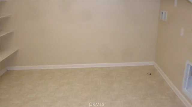 a view of a room with an empty space