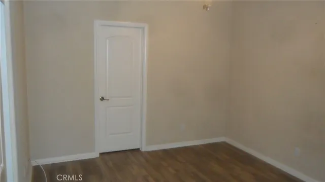 a view of small space with wooden floor