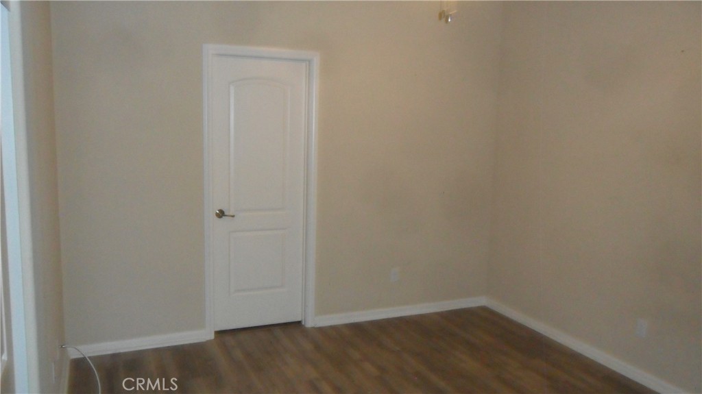 36277 Waxen Road Lake Elsinore, CA 92532 - Photo 9 of 27 a view of small space with wooden floor
