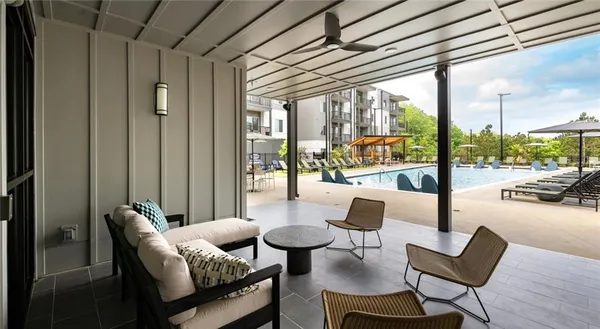 a view of an chairs and tables in the patio