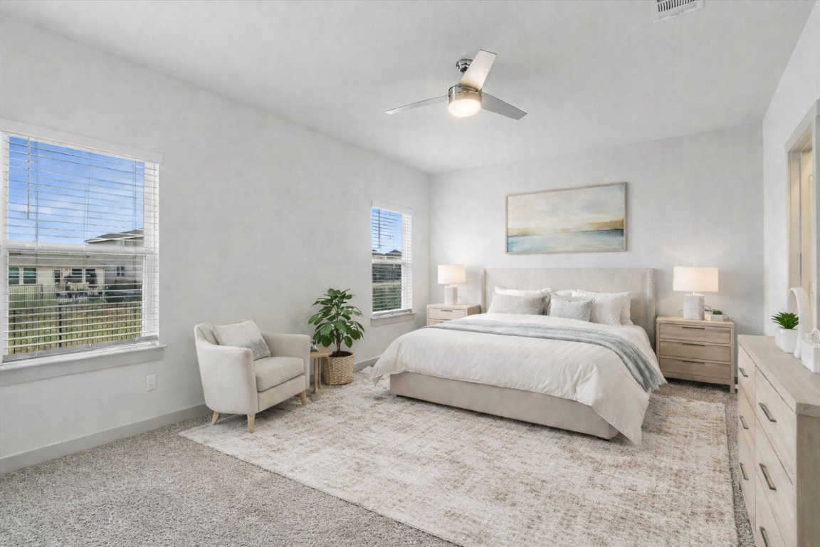 5125 Vanner Path Georgetown, TX 78626 - Photo 13 of 27 Bedroom with ceiling fan and light carpet. Digitally Staged.