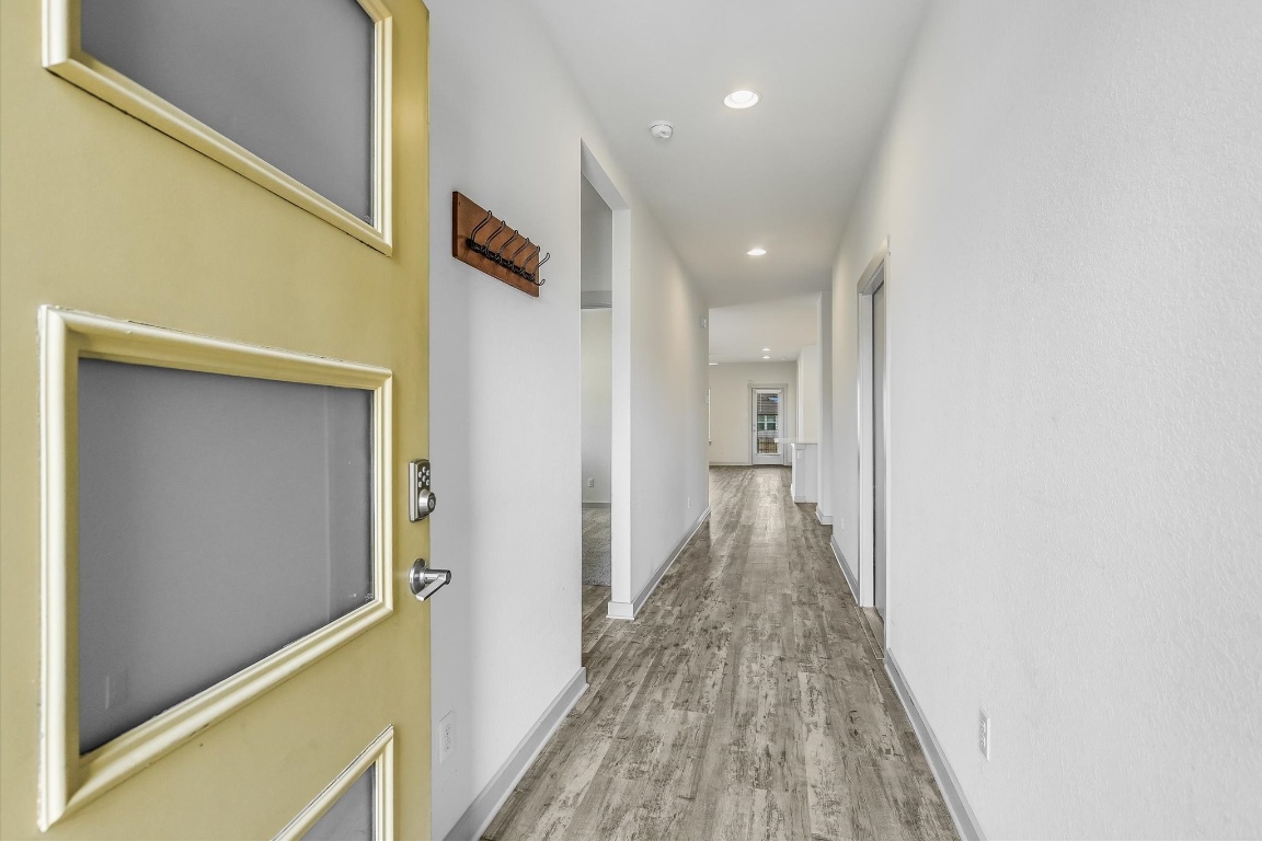 5125 Vanner Path Georgetown, TX 78626 - Photo 2 of 27 Corridor featuring light wood finished floors and recessed lighting
