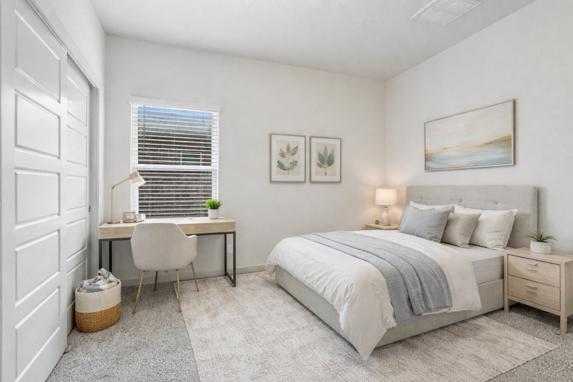 5125 Vanner Path Georgetown, TX 78626 - Photo 20 of 27 Bedroom with light colored carpet and an office area. Digitally Staged.