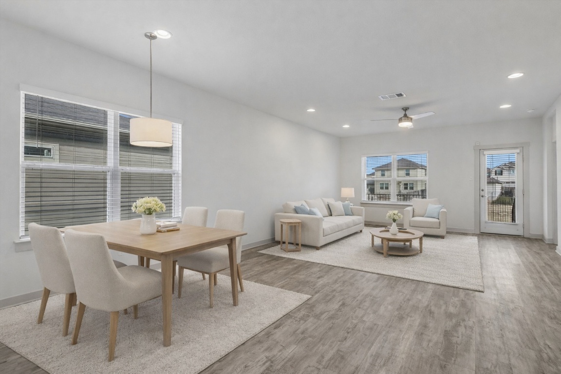 5125 Vanner Path Georgetown, TX 78626 - Photo 8 of 27 Dining room featuring light wood-style flooring, ceiling fan, and recessed lighting. Digitally Staged.