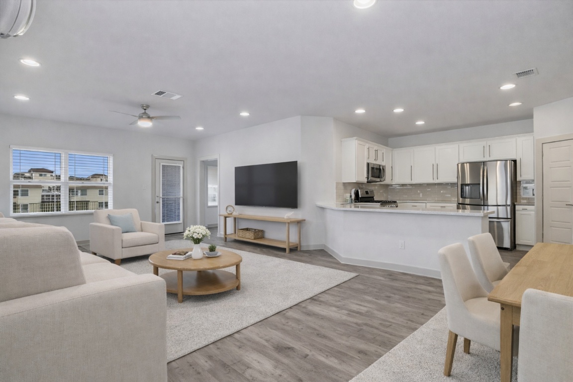 5125 Vanner Path Georgetown, TX 78626 - Photo 10 of 27 Living area with light wood finished floors, recessed lighting, and ceiling fan. Digitally Staged.