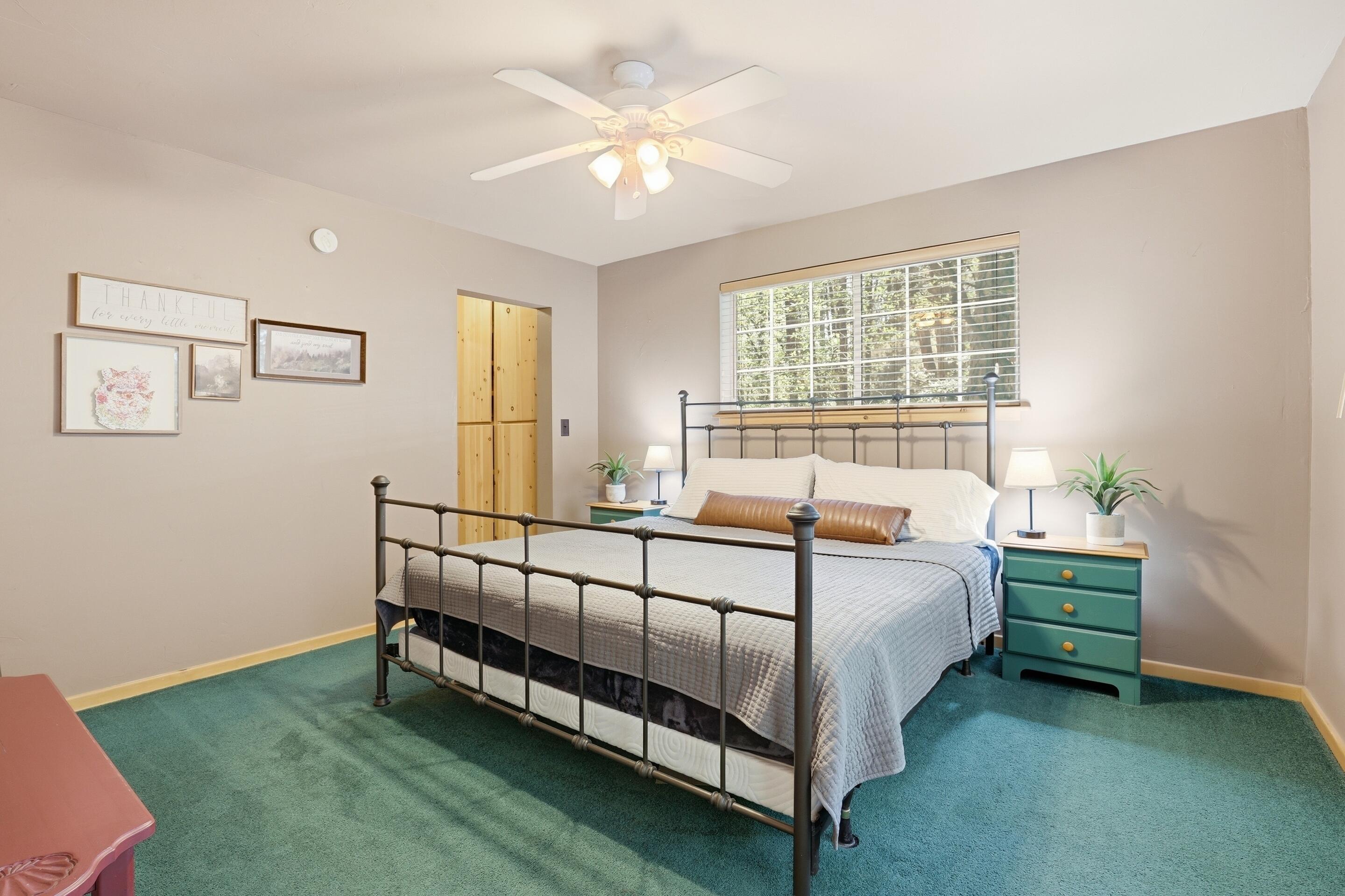 6322 Sharyn Road Pine, AZ 85544 - Photo 16 of 37 a bed sitting in a bedroom next to a window