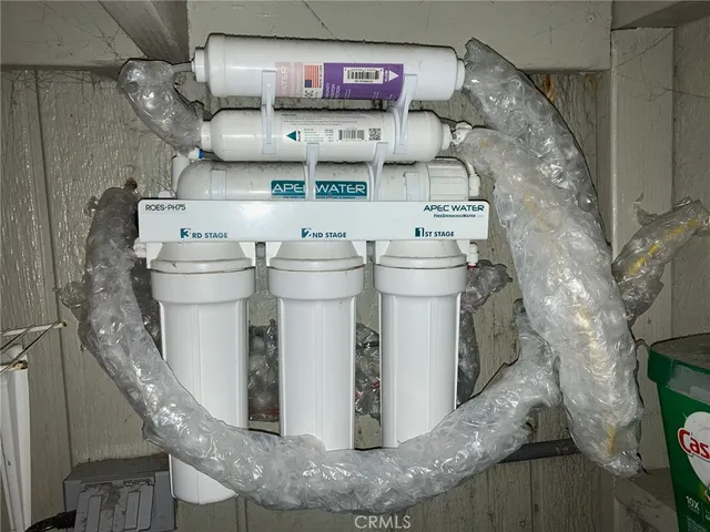 a utility room with stainless steel appliances