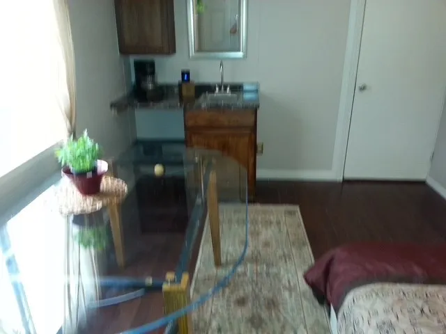 a vase of flowers sitting on a table