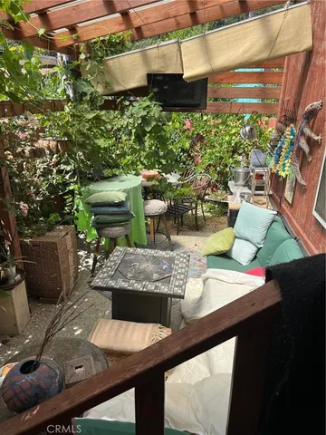 a vase of flowers sitting on a floor