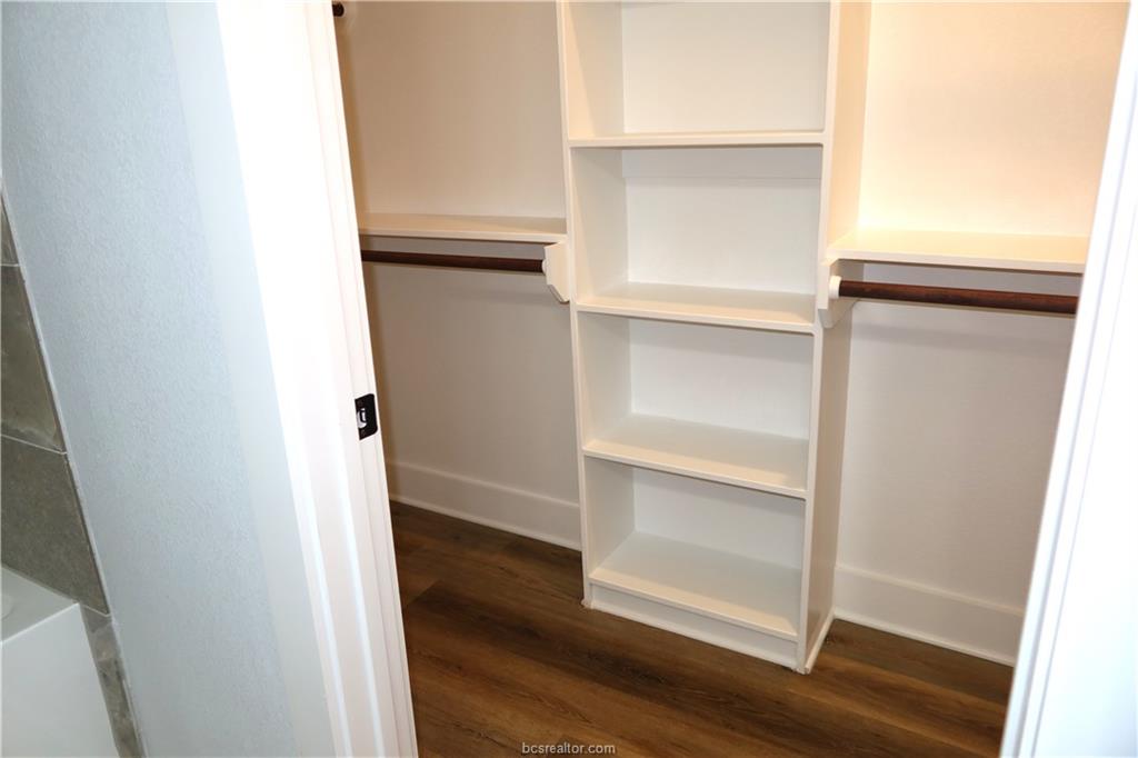2004 Reagan Court Bryan, TX 77802 - Photo 10 of 19 a view of walk in closet with empty racks