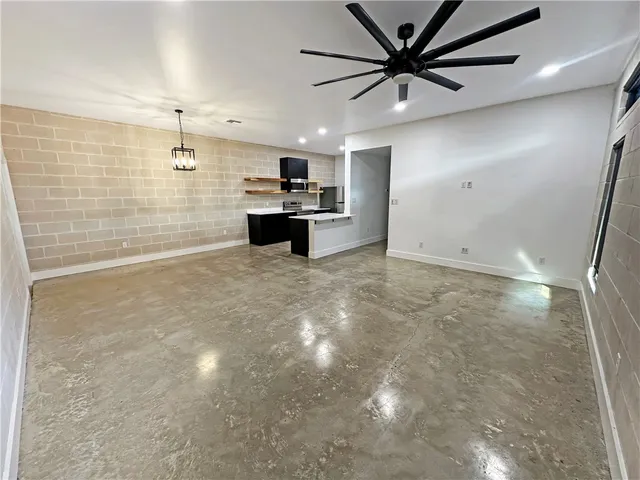 a bathroom with a tub sink vanity and a mirror
