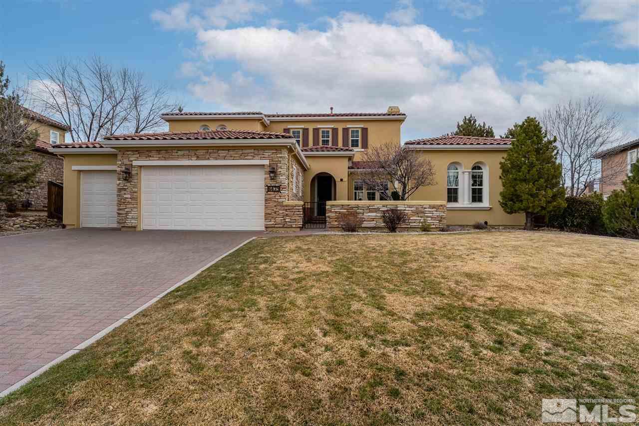 8475 Fairway Chase Trail Reno, NV 89523 - Photo 1 of 40 a front view of a house with a yard