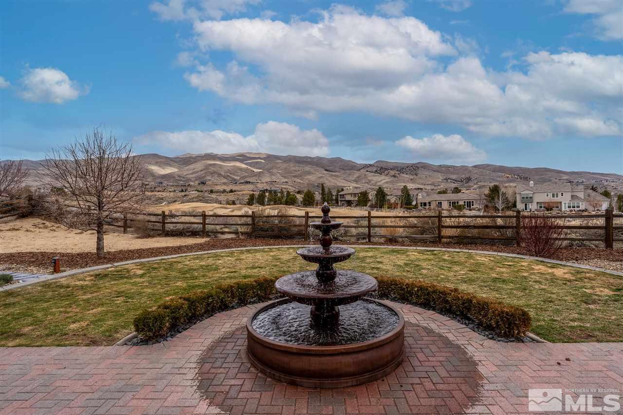 8475 Fairway Chase Trail Reno, NV 89523 - Photo 28 of 40 a view of a swimming pool with a fountain
