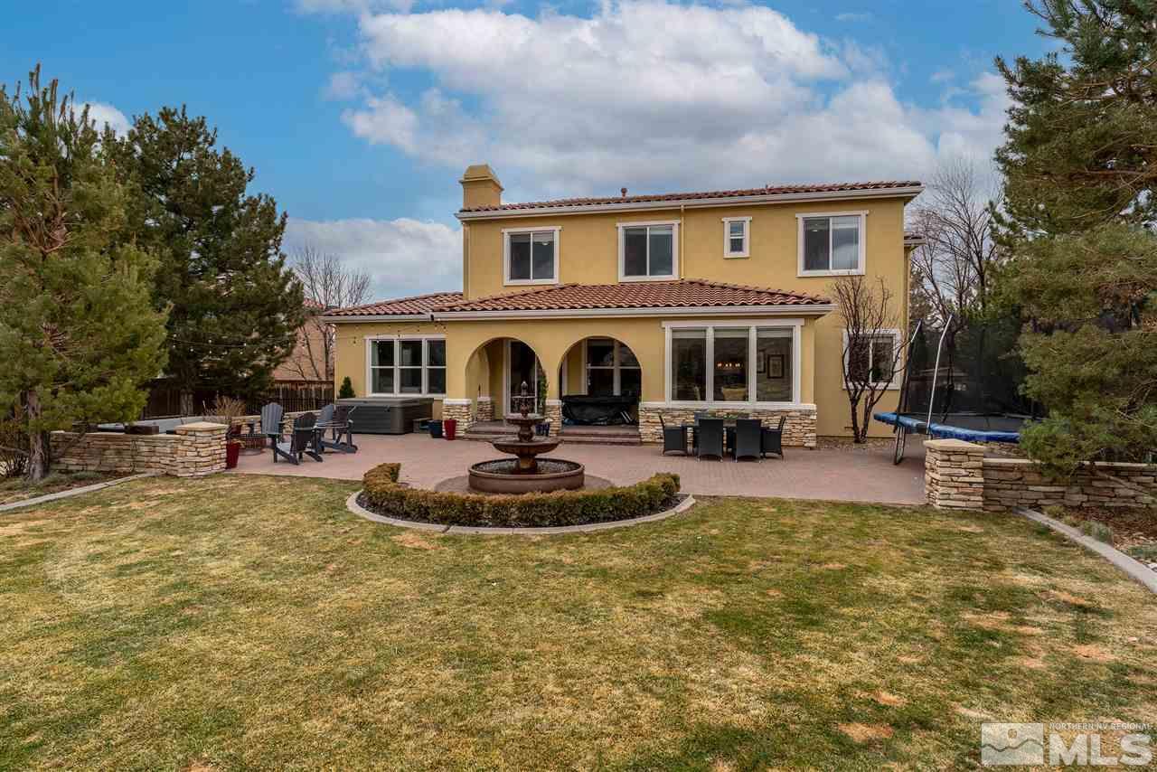 8475 Fairway Chase Trail Reno, NV 89523 - Photo 30 of 40 a view of a house with swimming pool and sitting area