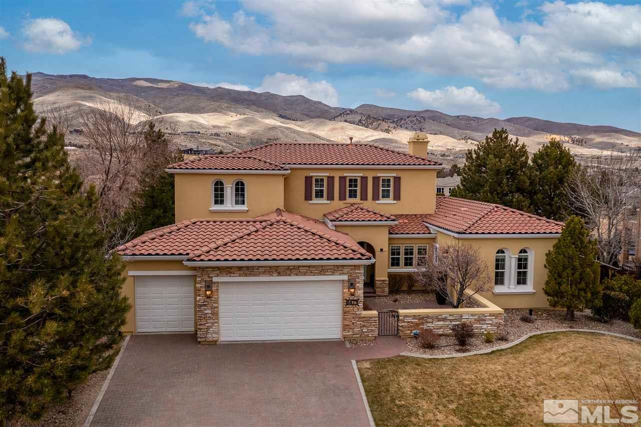 8475 Fairway Chase Trail Reno, NV 89523 - Photo 32 of 40 a front view of a house with a yard