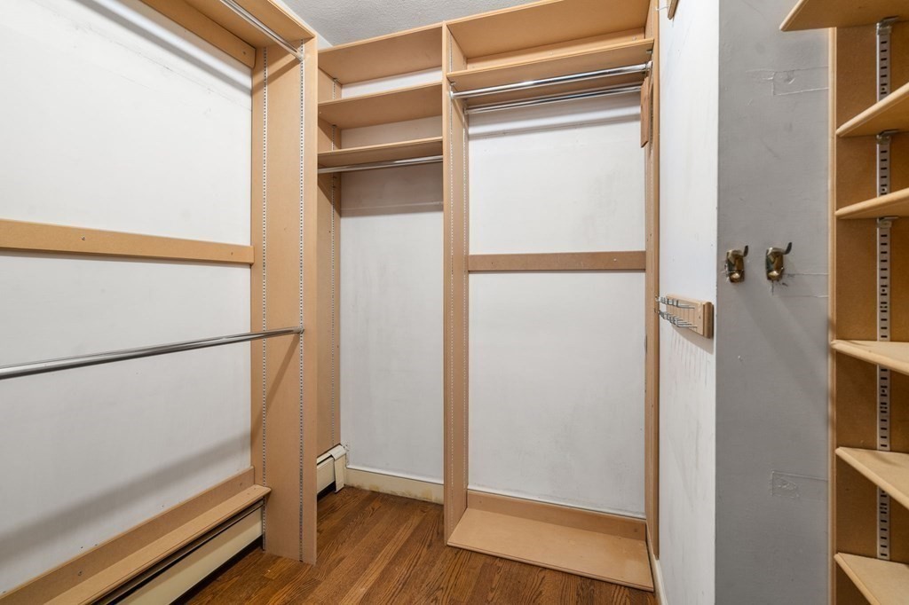 59 Spywood Road Sherborn, MA 01770 - Photo 18 of 40 a view of closet with wooden floor