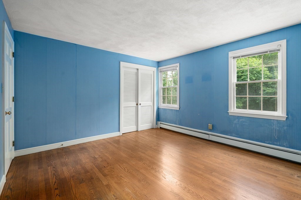 59 Spywood Road Sherborn, MA 01770 - Photo 19 of 40 a view of an empty room with a window
