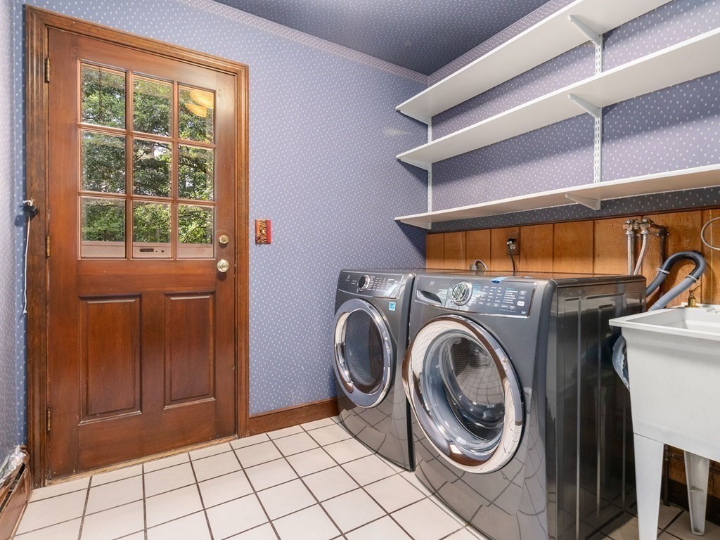 59 Spywood Road Sherborn, MA 01770 - Photo 25 of 40 a view of a storage & utility room with washer and dryer