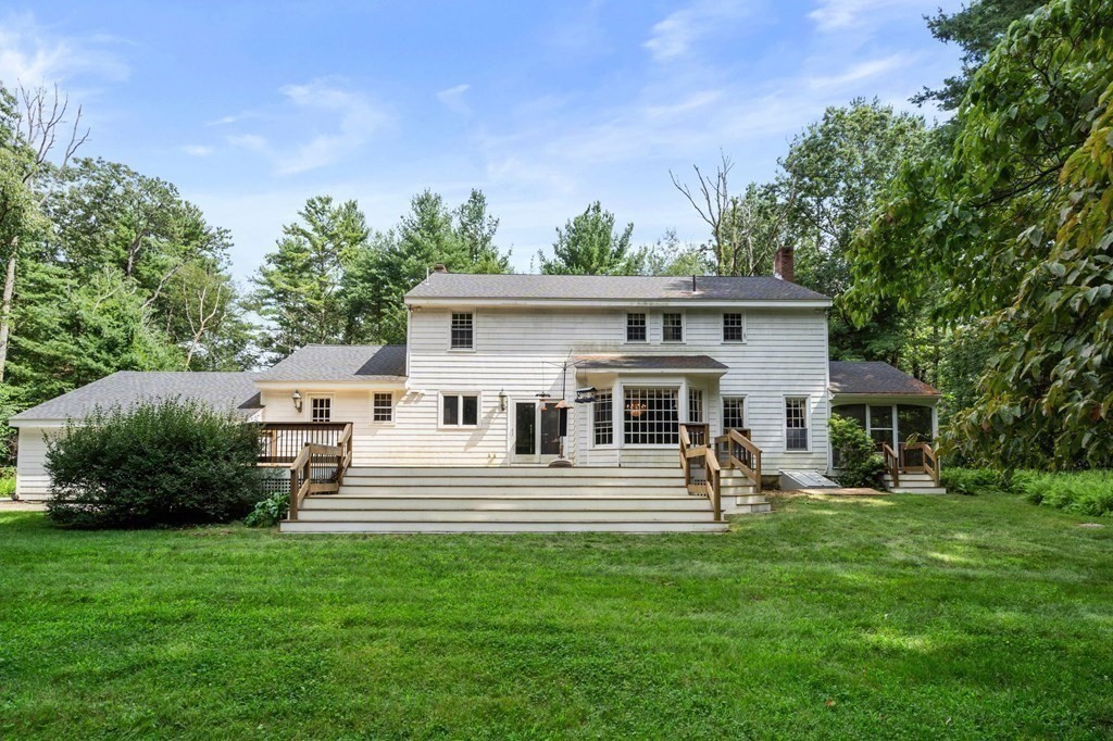 59 Spywood Road Sherborn, MA 01770 - Photo 29 of 40 a front view of a house with garden
