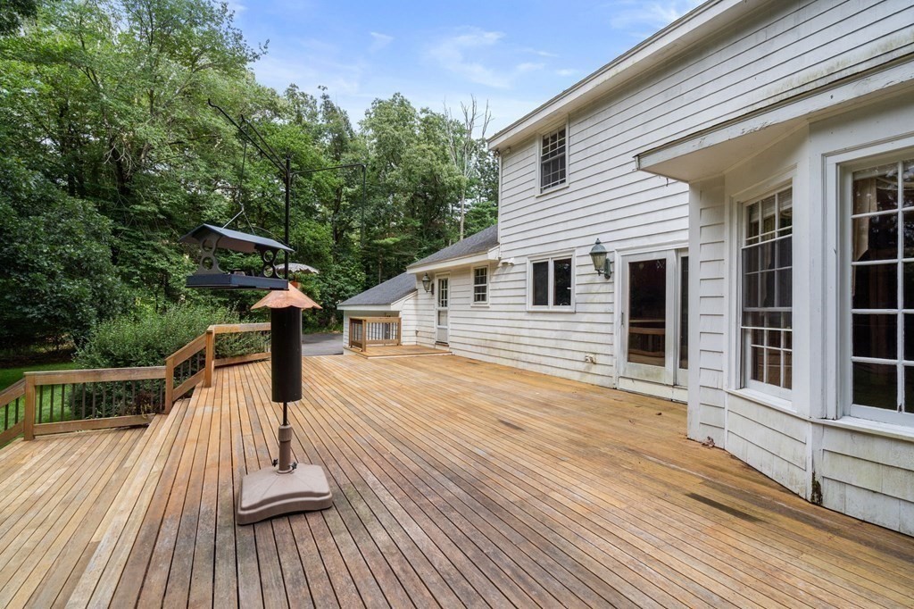 59 Spywood Road Sherborn, MA 01770 - Photo 35 of 40 a view of a house with wooden deck