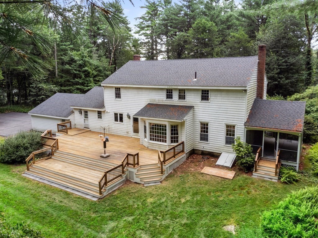 59 Spywood Road Sherborn, MA 01770 - Photo 36 of 40 an aerial view of a house with a yard table and chairs