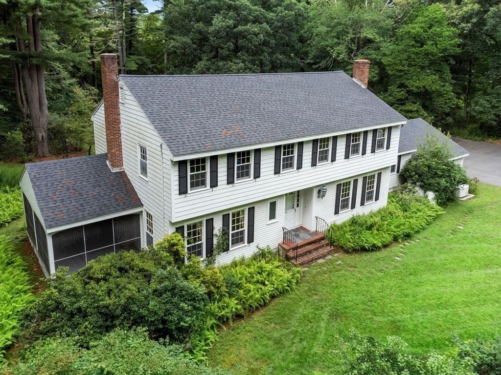 59 Spywood Road Sherborn, MA 01770 - Photo 38 of 40 a aerial view of a house next to a yard