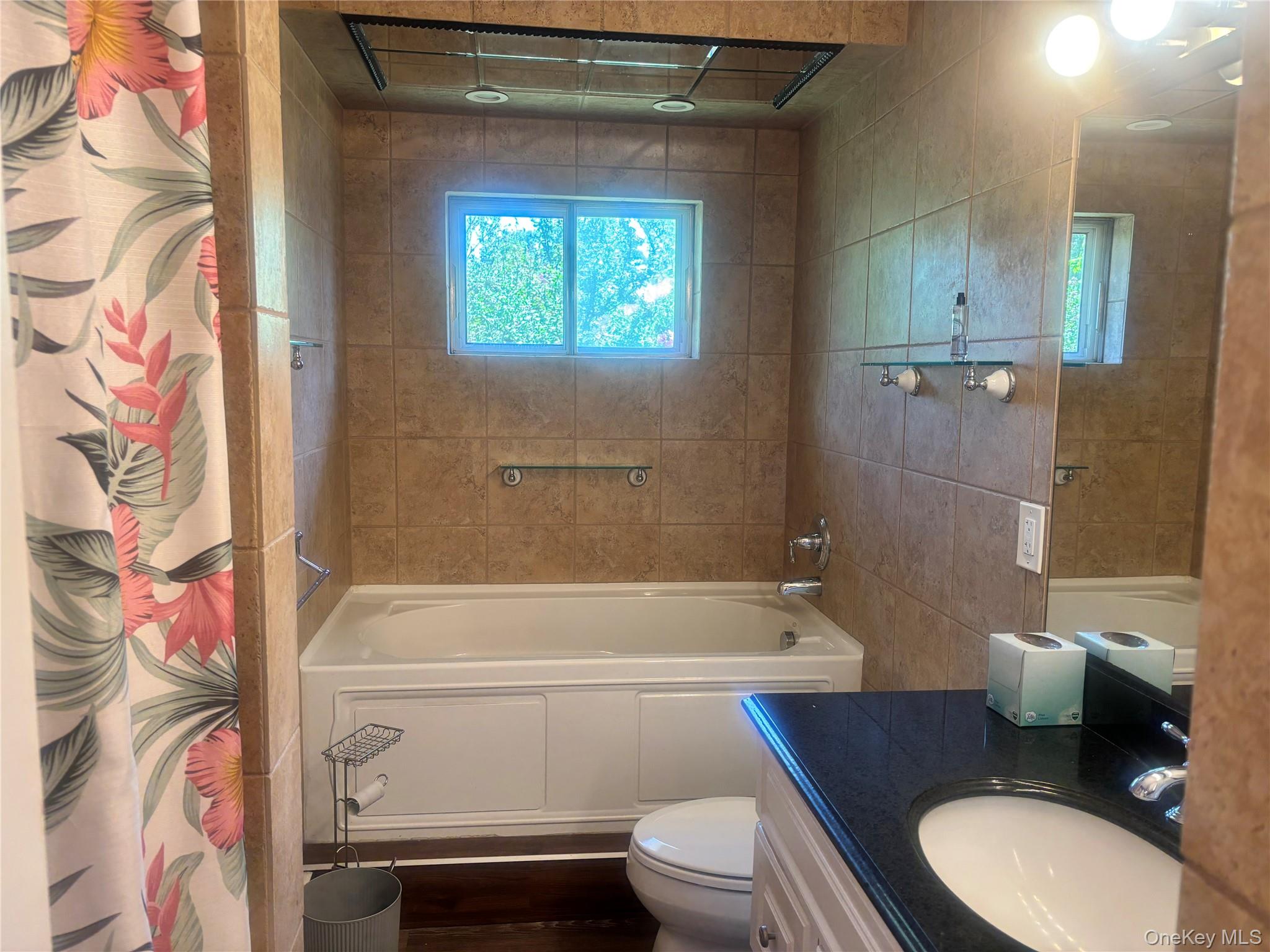 Undisclosed Address Shirley, NY 11967 - Photo 4 of 6 a bathroom with a toilet and a shower